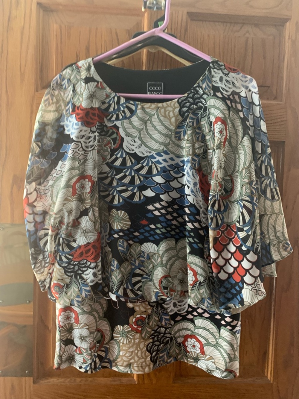 Women’s size M Coco Bianco top.
